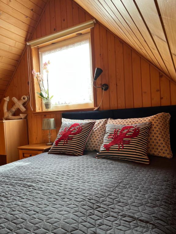 Postel nebo postele na pokoji v ubytování Domki Letniskowe Edi