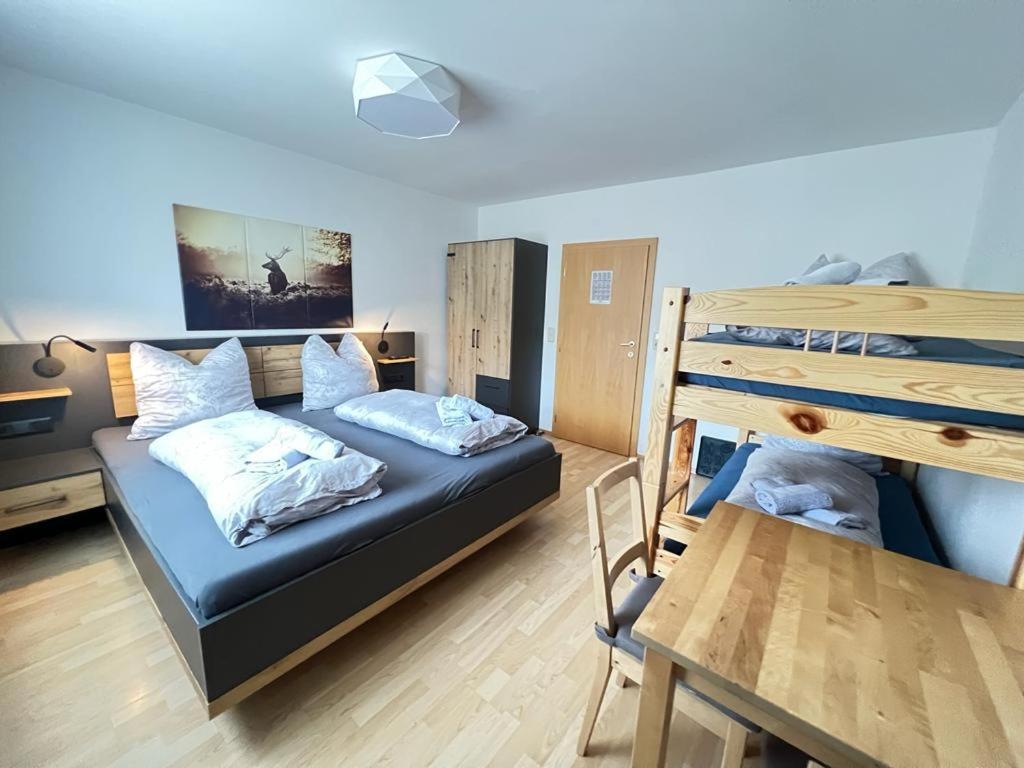 Postel nebo postele na pokoji v ubytování Haus Heimat Wagrain