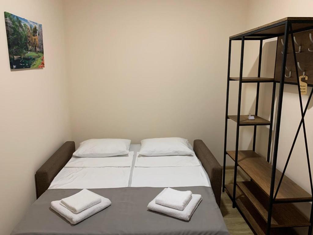 Postel nebo postele na pokoji v ubytování Villa Vitis