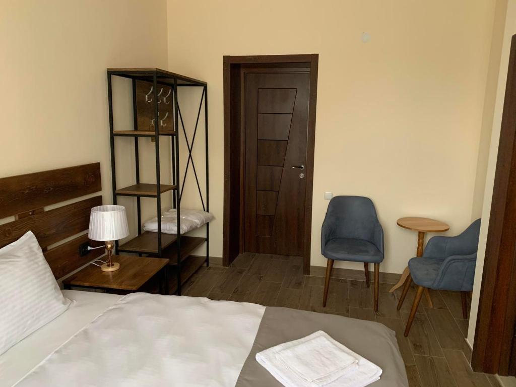 Postel nebo postele na pokoji v ubytování Villa Vitis