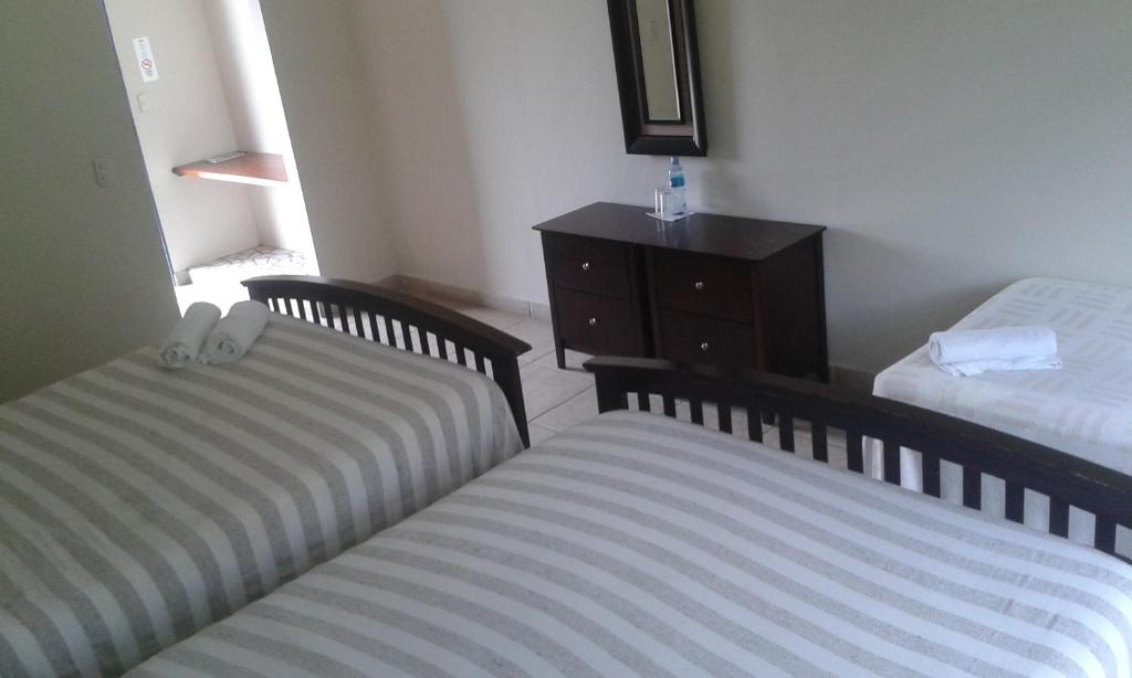 Cama o camas de una habitación en Hotel Campestre