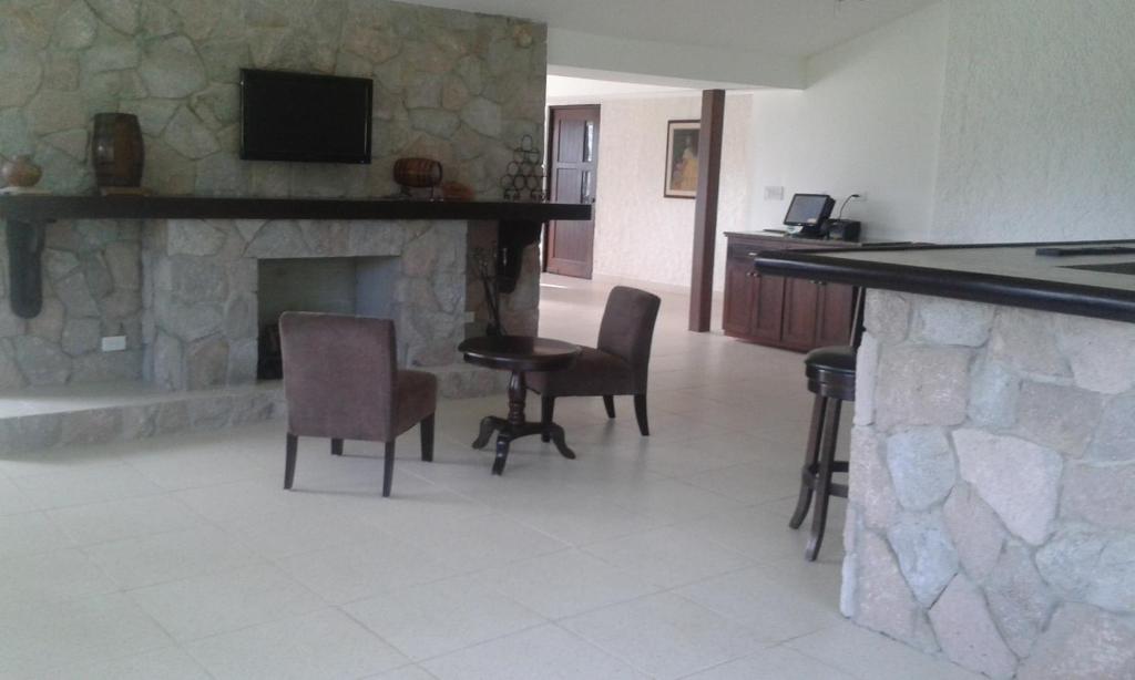 Una cocina o zona de cocina en Hotel Campestre