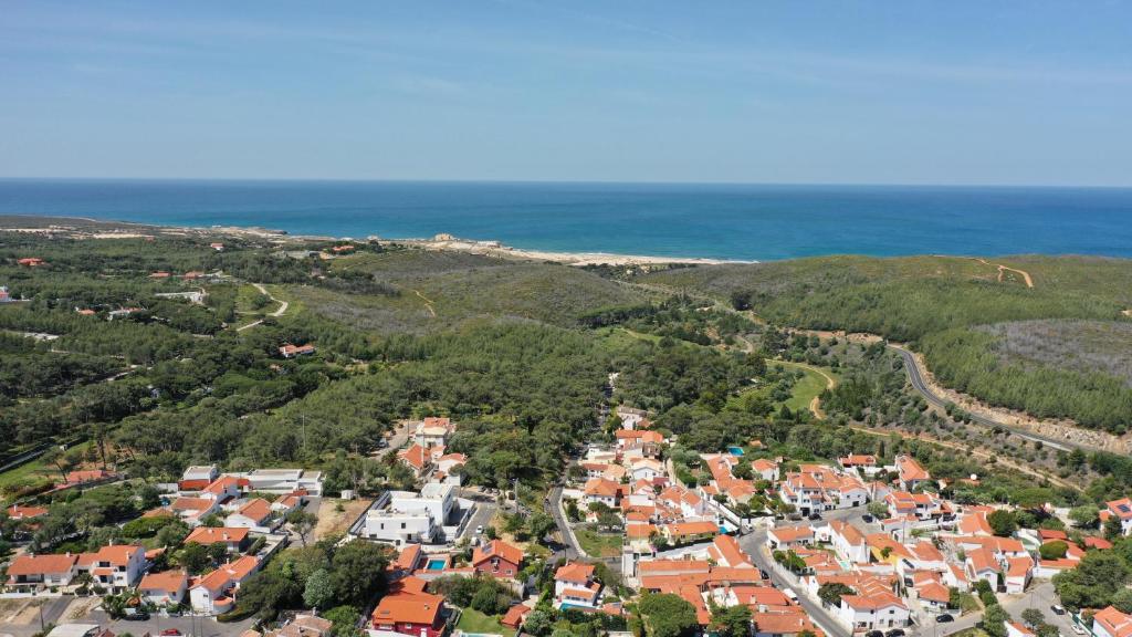 an aerial view of a small town near the ocean at Sea'Ya Thoughtful Stays - Villas in Cascais