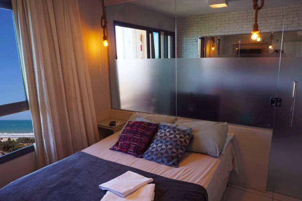 Postel nebo postele na pokoji v ubytování Cumbuco - VGSun Apartment 402
