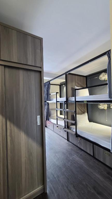 Postel nebo postele na pokoji v ubytování Hanoi Lucky Hostel