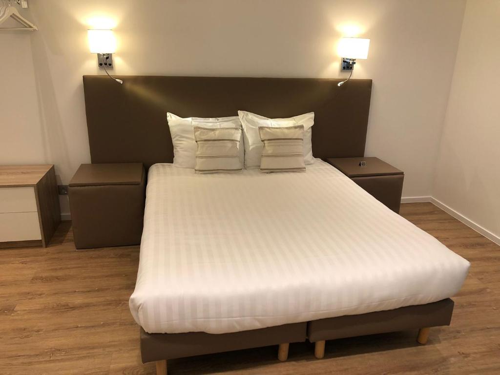 Voodi või voodid majutusasutuse Shelter-rooms toas