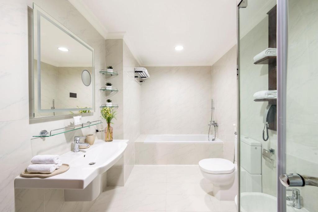 Ein Badezimmer in der Unterkunft Dusit Hotel & Suites - Doha