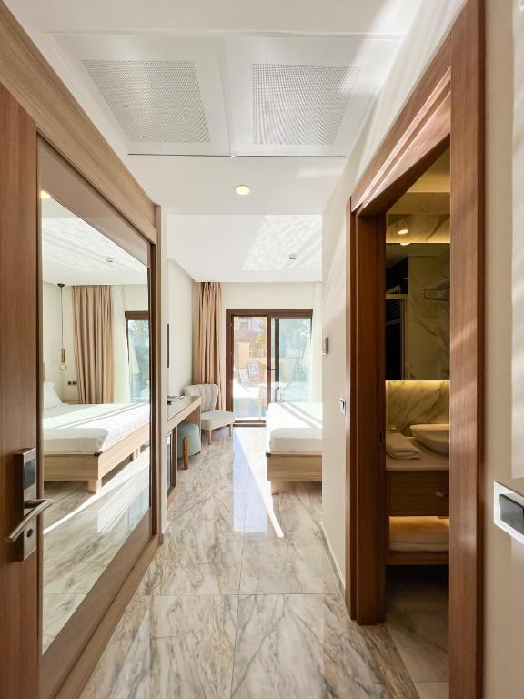 Postel nebo postele na pokoji v ubytování Dna Hotel Dalyan