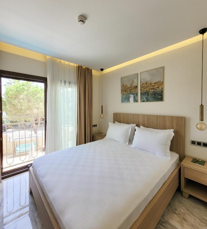 Postel nebo postele na pokoji v ubytování Dna Hotel Dalyan
