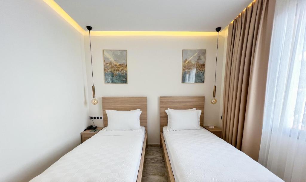 Postel nebo postele na pokoji v ubytování Dna Hotel Dalyan