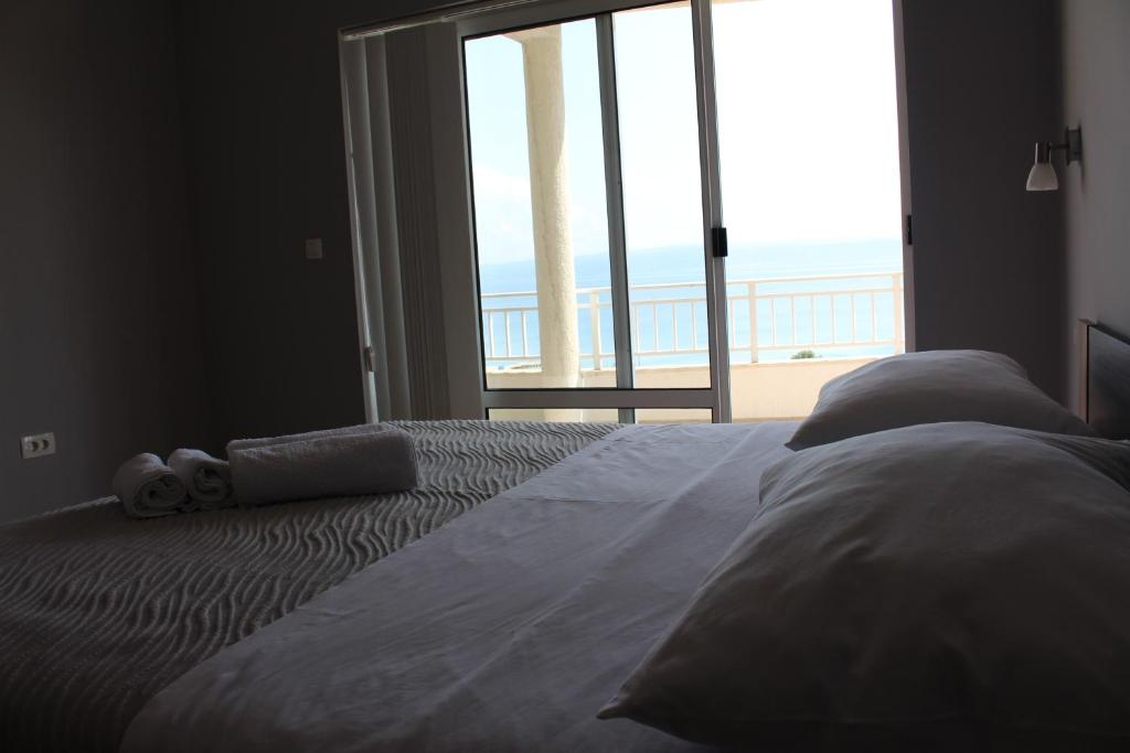 Posteľ alebo postele v izbe v ubytovaní Beachside Apartments Znjan