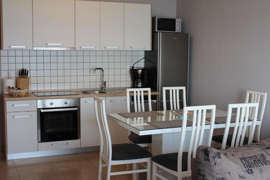 Kuchyňa alebo kuchynka v ubytovaní Beachside Apartments Znjan