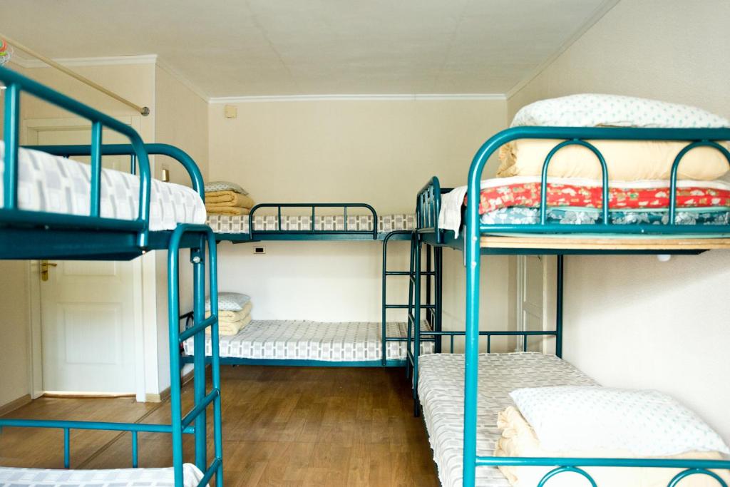 a group of bunk beds in a room at UB Guesthouse & Tours in Ulaanbaatar