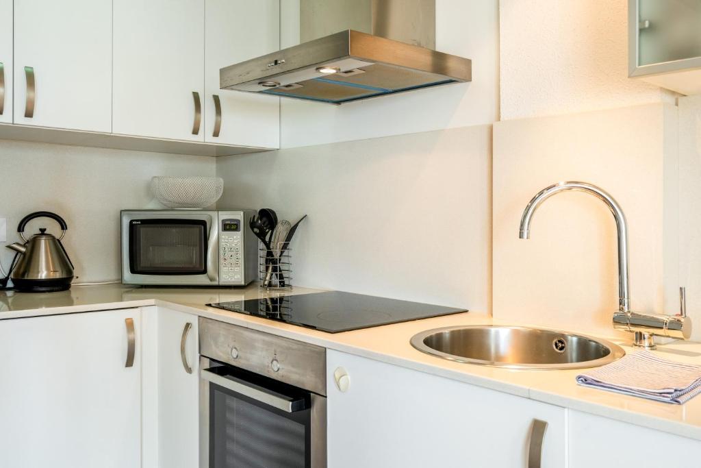 Kuchyň nebo kuchyňský kout v ubytování WELCS APARTAMENTO 015 EMP con terraza y vistas