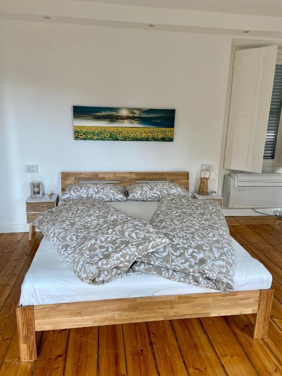 Łóżko lub łóżka w pokoju w obiekcie Casa Doris