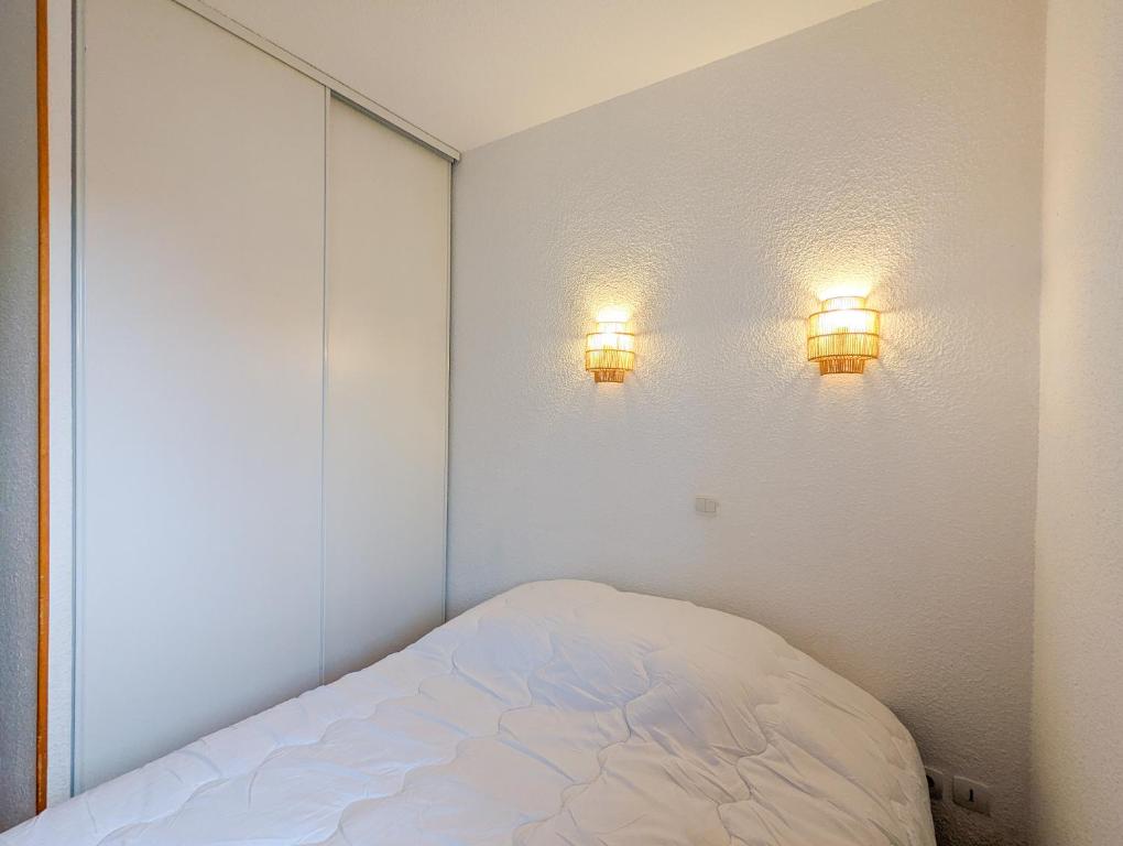 Posteľ alebo postele v izbe v ubytovaní Appartement 2/4 pers, Résidence 4* Les Hauts de Valmeinier, Centre station