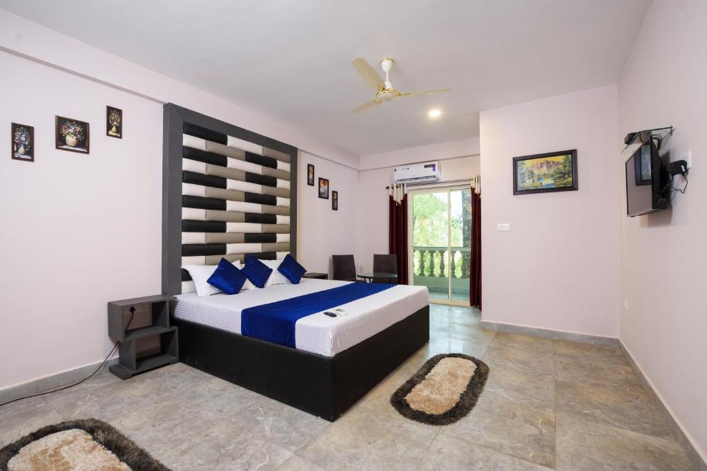 Postel nebo postele na pokoji v ubytování Casa Da Village Calangute Goa