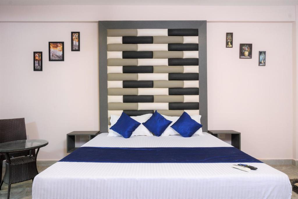 Postel nebo postele na pokoji v ubytování Casa Da Village Calangute Goa