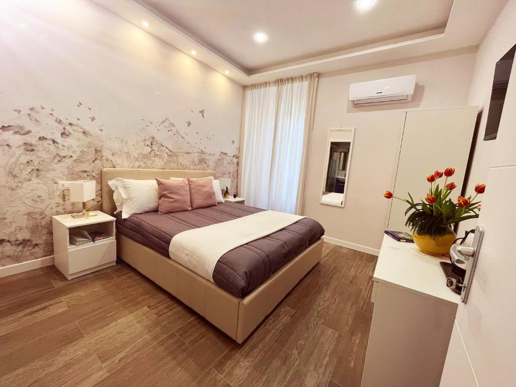 um quarto com uma cama num quarto em REdreams em Roma