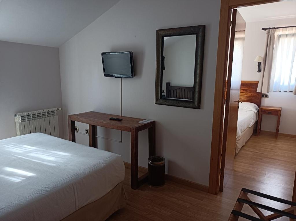 Postel nebo postele na pokoji v ubytování Hotel Rural Casa de Campo