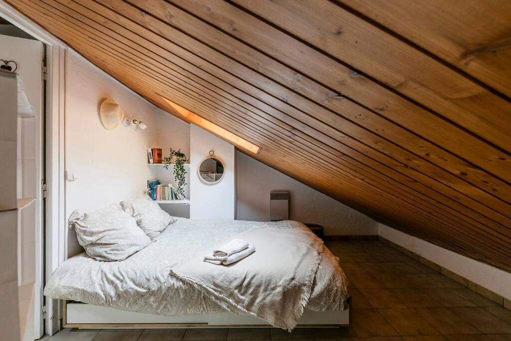 Postel nebo postele na pokoji v ubytování T2 de charme, SPA / Thermes d’Uriage, Ski