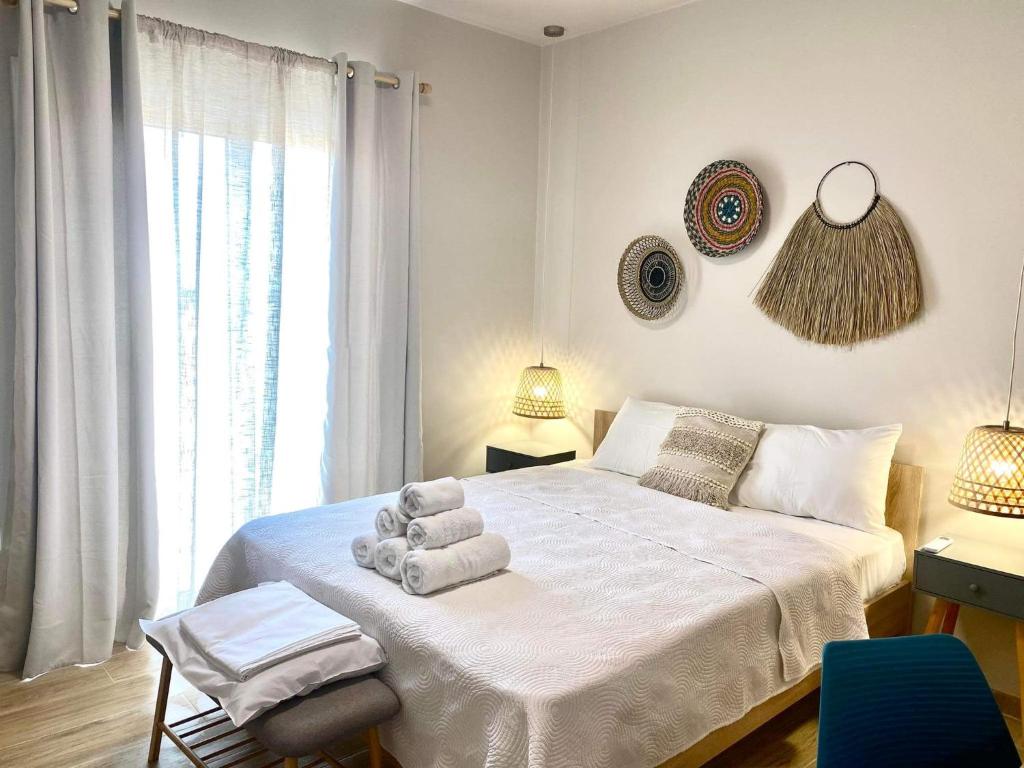 Posteľ alebo postele v izbe v ubytovaní Boho Natural Beachfront Detached House