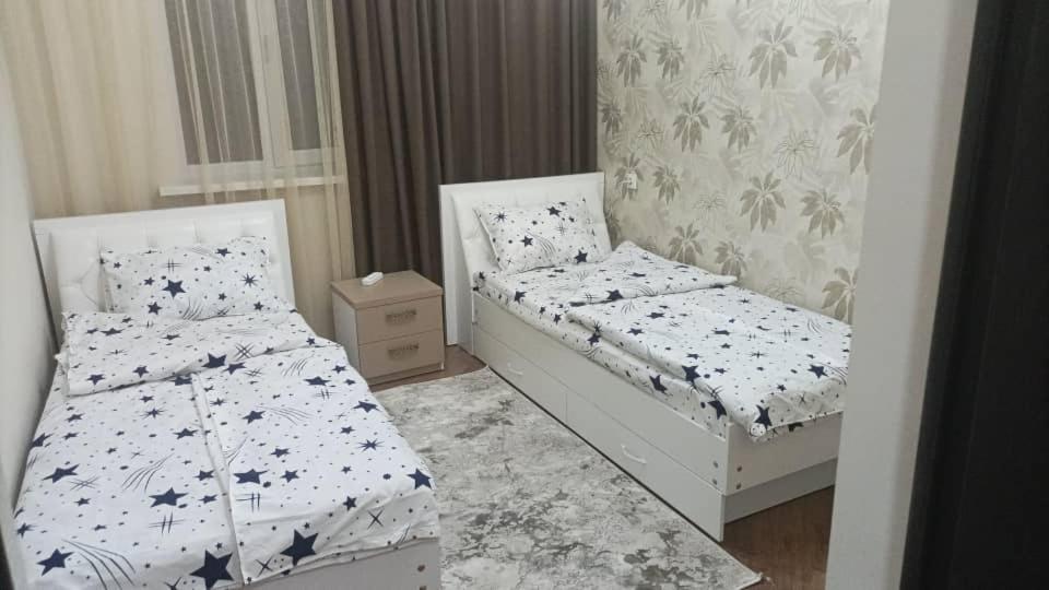 Postel nebo postele na pokoji v ubytování Роща 7