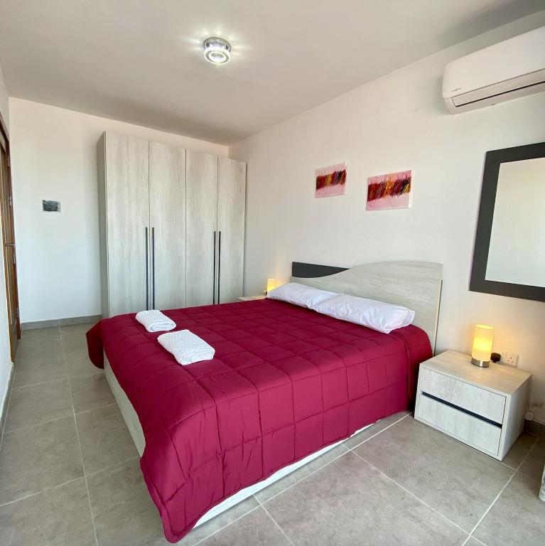 Postel nebo postele na pokoji v ubytování F1 1 Lovely room, bathroom and living shared