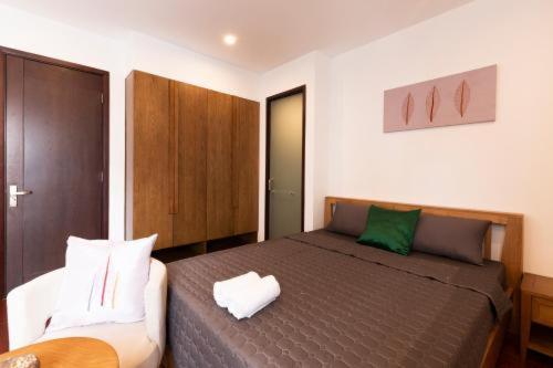 Postel nebo postele na pokoji v ubytování Bao Hoang Dalat