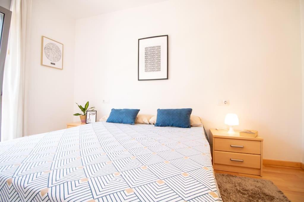 A bed or beds in a room at Espectacular vivienda con piscina climatizada