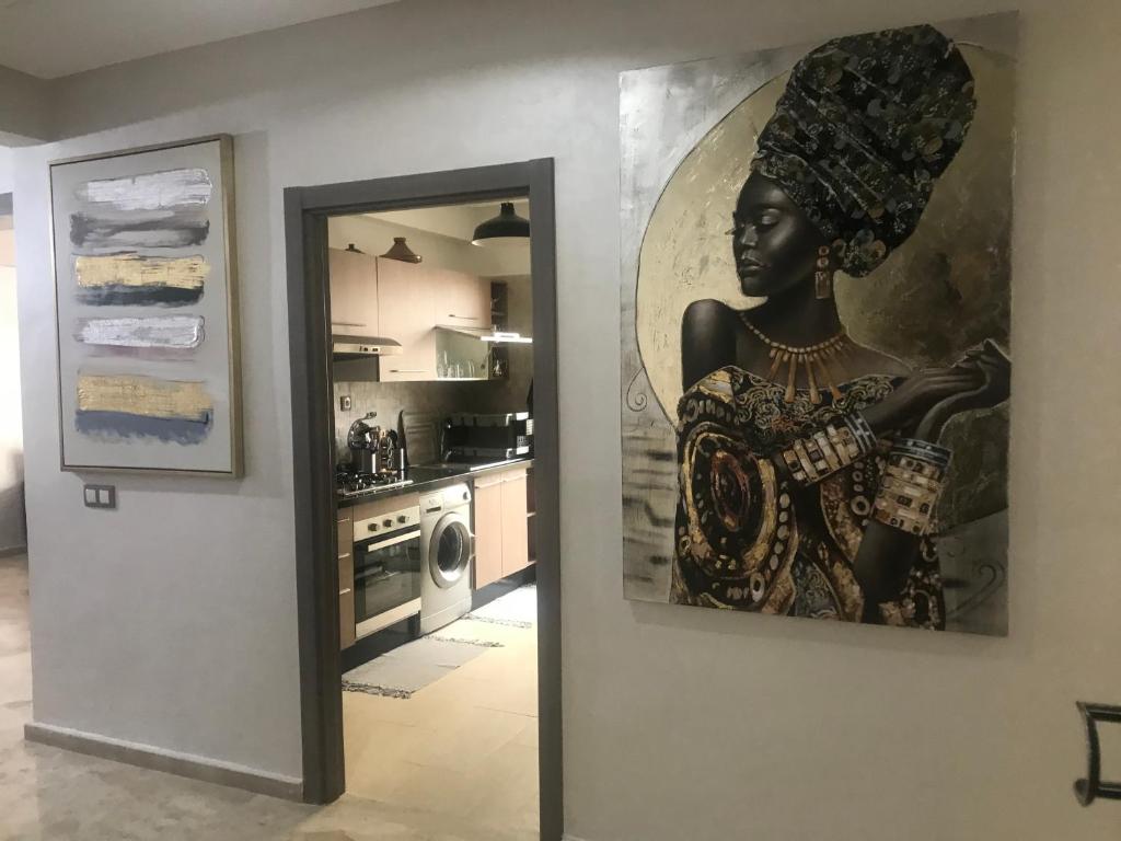 Η κουζίνα ή μικρή κουζίνα στο Chic-Moderne-Cosy. Au cœur du Parc, proche plage