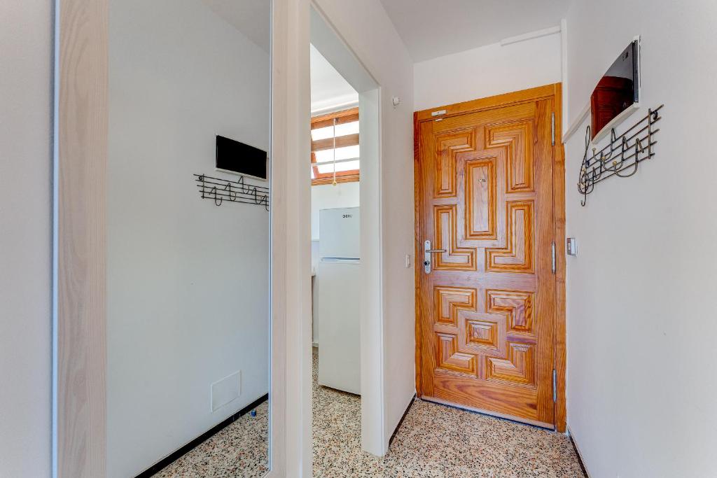Telewizja i/lub zestaw kina domowego w obiekcie Los Cristianos Achacay Bluesky Apartment