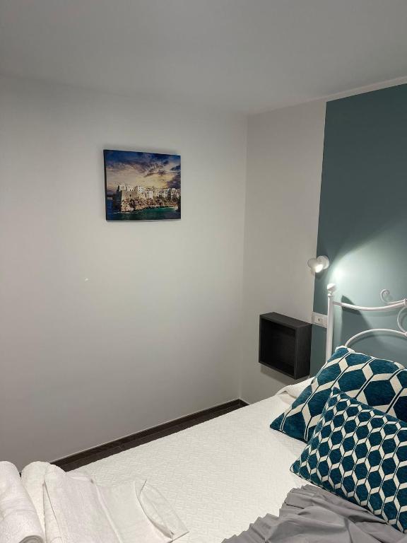 Una cama o camas en una habitación de Casa Mariù
