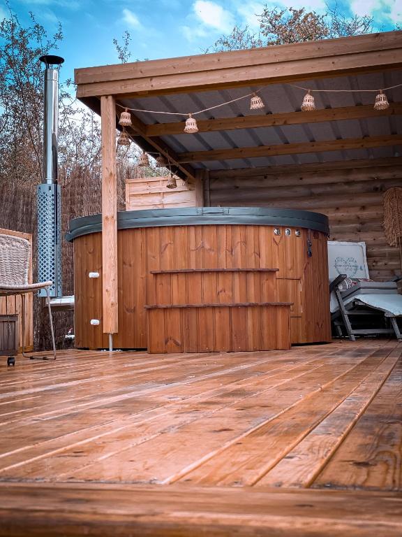 Fotografie z fotogalerie ubytování Cabane au style scandinave et son bain nordique v destinaci Bouillon
