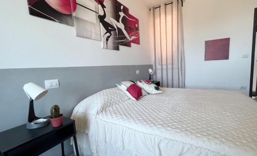 Łóżko lub łóżka w pokoju w obiekcie A casa di Asja
