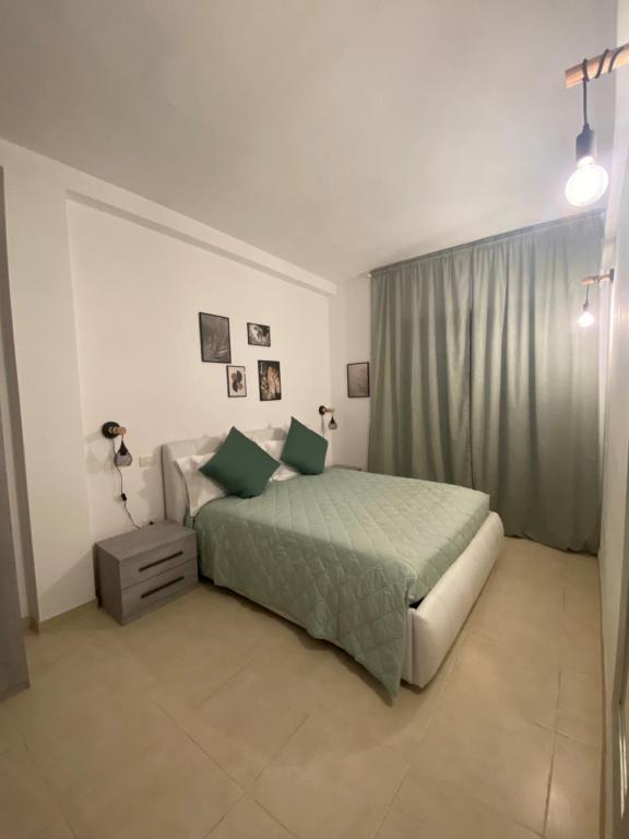 Posteľ alebo postele v izbe v ubytovaní Civico 107 - Apartment with Private Parking