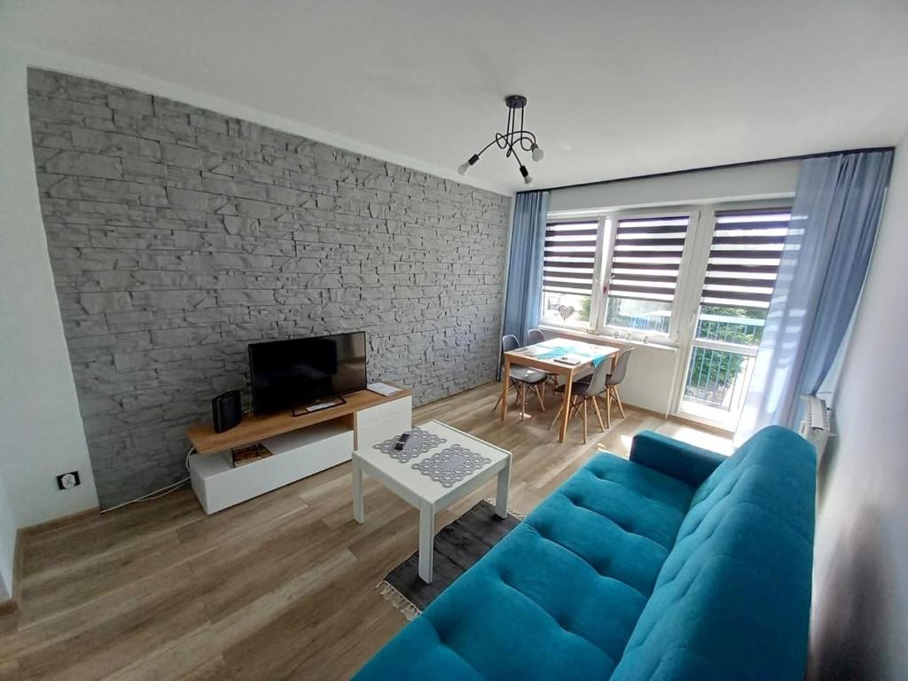 TV a/nebo společenská místnost v ubytování Apartamenty A&B Silver