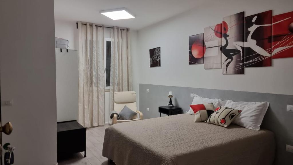 Łóżko lub łóżka w pokoju w obiekcie A casa di Asja