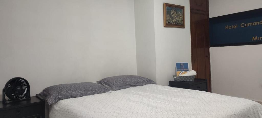 Postel nebo postele na pokoji v ubytování HOTEL CUMANDAY