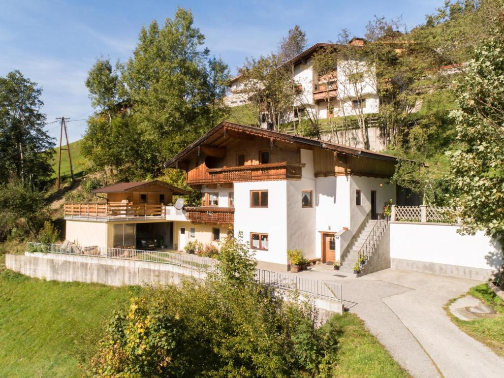 a house on the side of a mountain at Apartment Schragl in Zell am Ziller