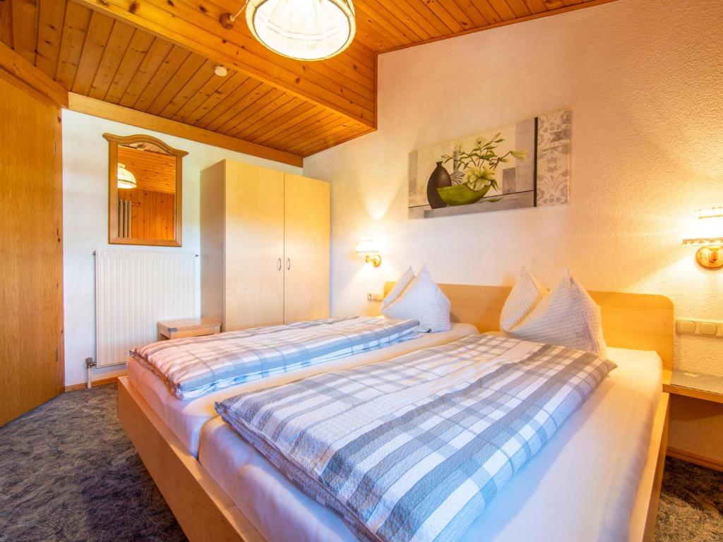 Postel nebo postele na pokoji v ubytování Monteschiel