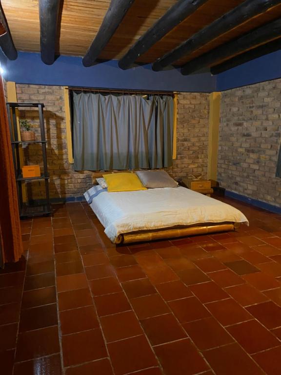 Postel nebo postele na pokoji v ubytování Hostelline