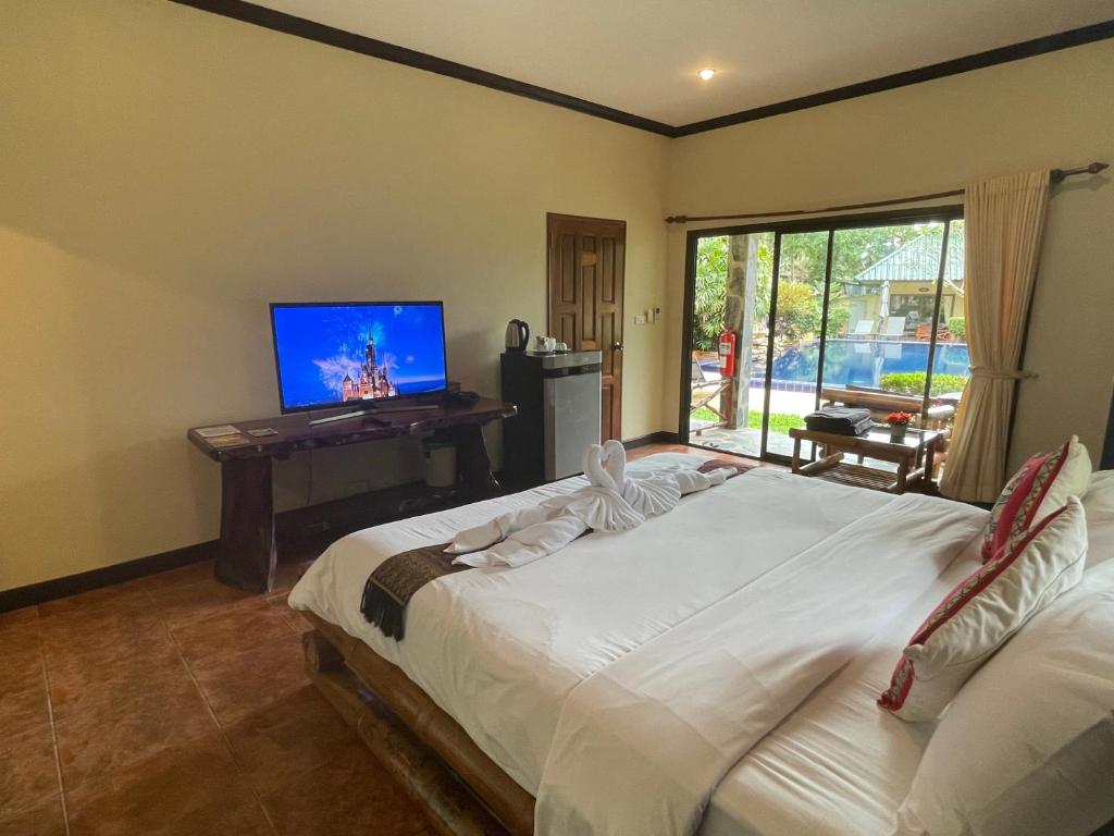 TV a/nebo společenská místnost v ubytování Garden Resort