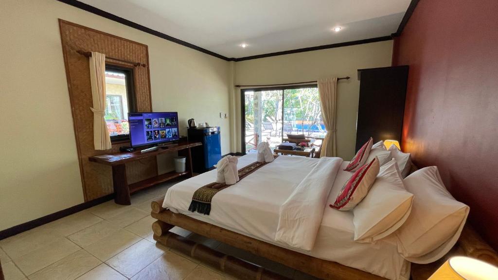 TV a/nebo společenská místnost v ubytování Garden Resort