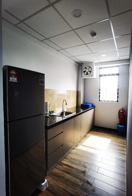 Kuchyň nebo kuchyňský kout v ubytování 3-Plus Hotel