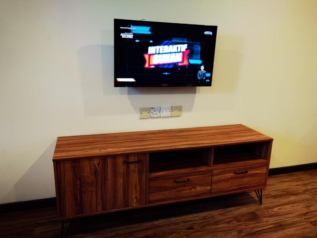 TV a/nebo společenská místnost v ubytování 3-Plus Hotel