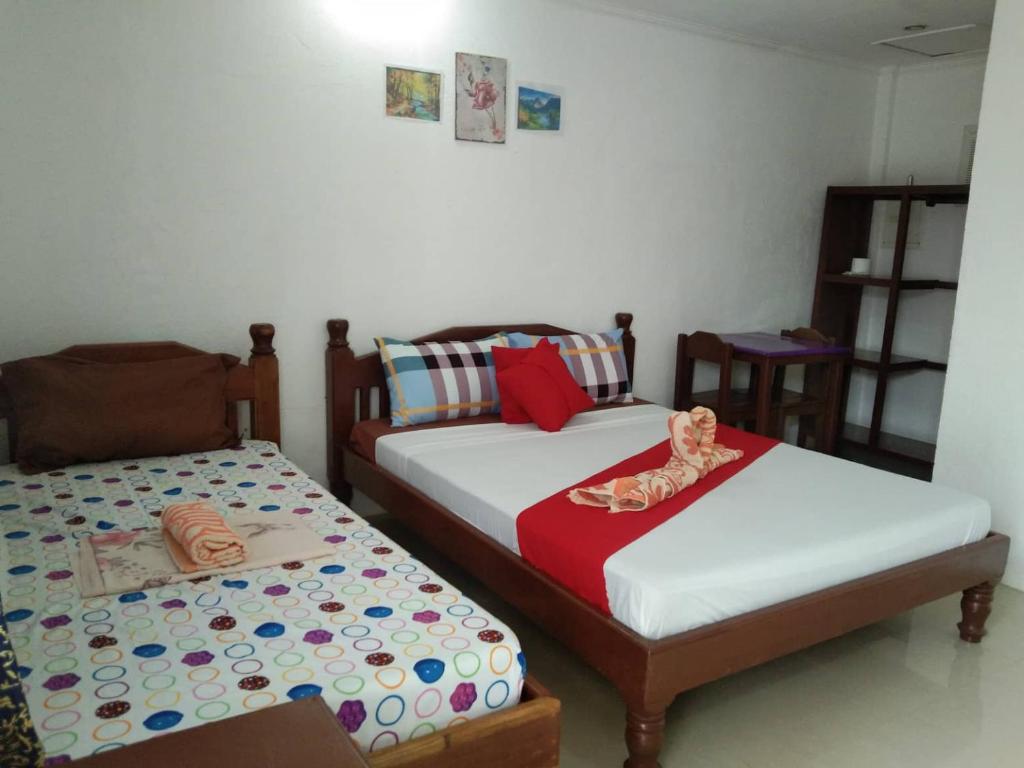 Postel nebo postele na pokoji v ubytování PEDRO'S RESORT
