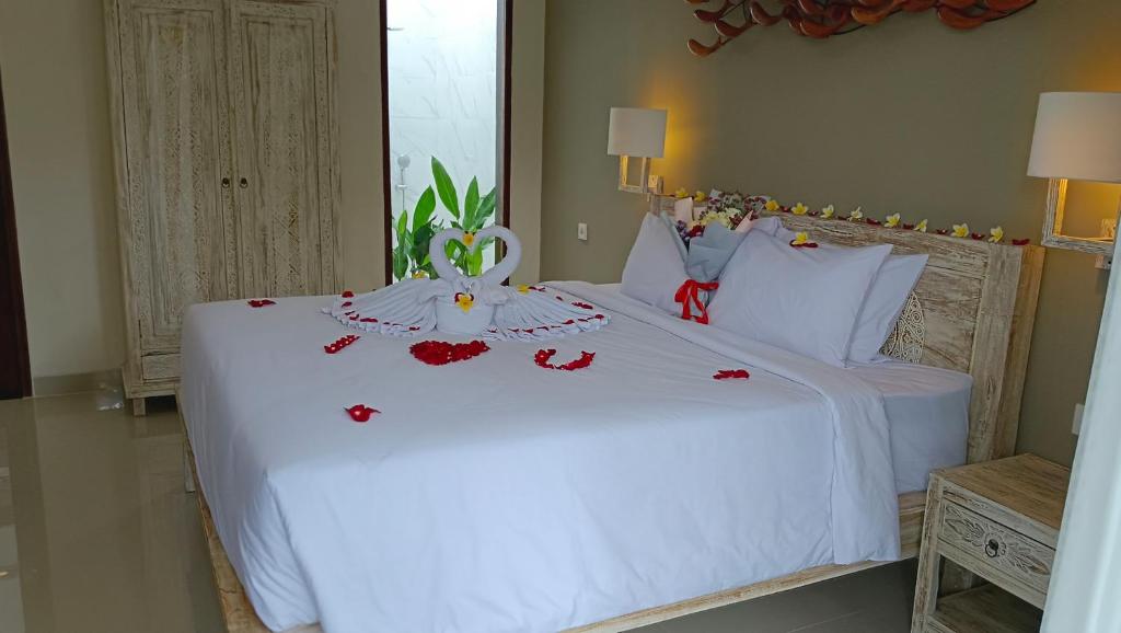 Kubu Garden Suites & Villas Nusa Dua房間的床