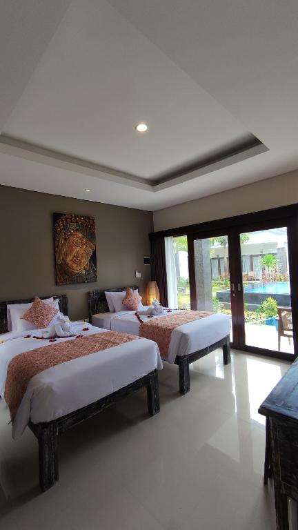 Kubu Garden Suites & Villas Nusa Dua房間的床