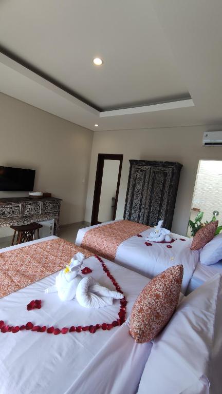 Kubu Garden Suites & Villas Nusa Dua房間的床